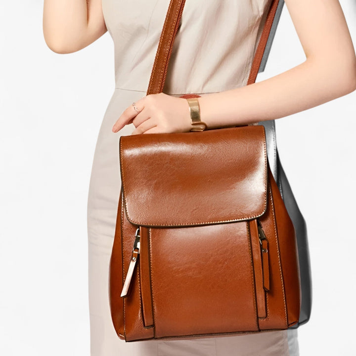 Zaino donna in ecopelle resistente, design moderno e versatile per ogni outfit. Borsa elegante e funzionale.