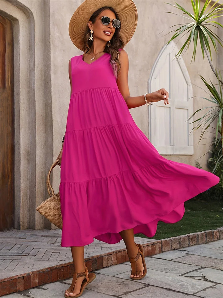 Abito lungo donna estivo casual con balze e scollo a V. Perfetto per un look fresco e senza maniche.