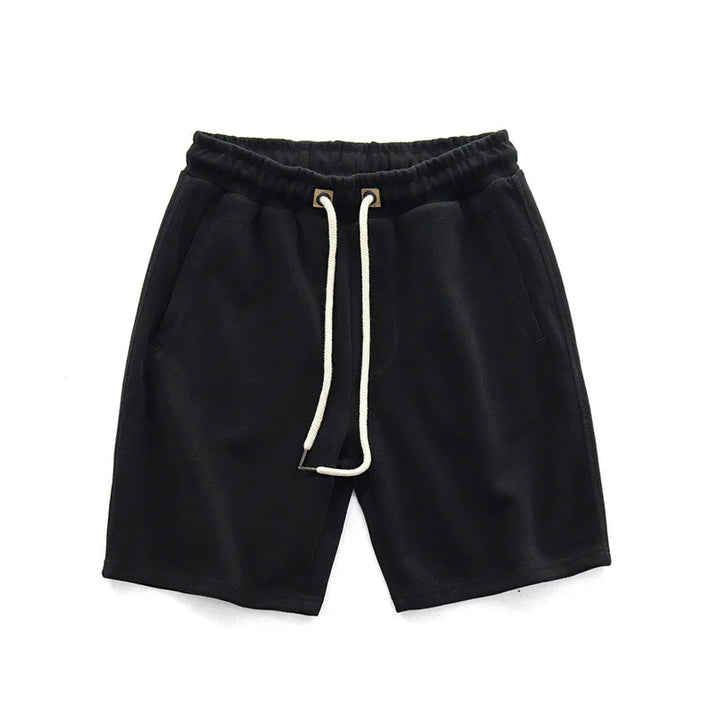 Pantaloncini uomo neri, leggeri e comodi, con vita elastica regolabile e pratiche tasche per sport o tempo libero.