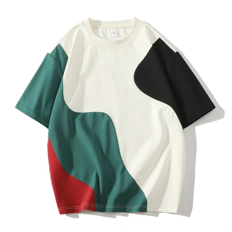 Maglietta uomo a maniche corte con blocchi di colore vivaci e vestibilità strutturata. Stile moderno e confortevole.