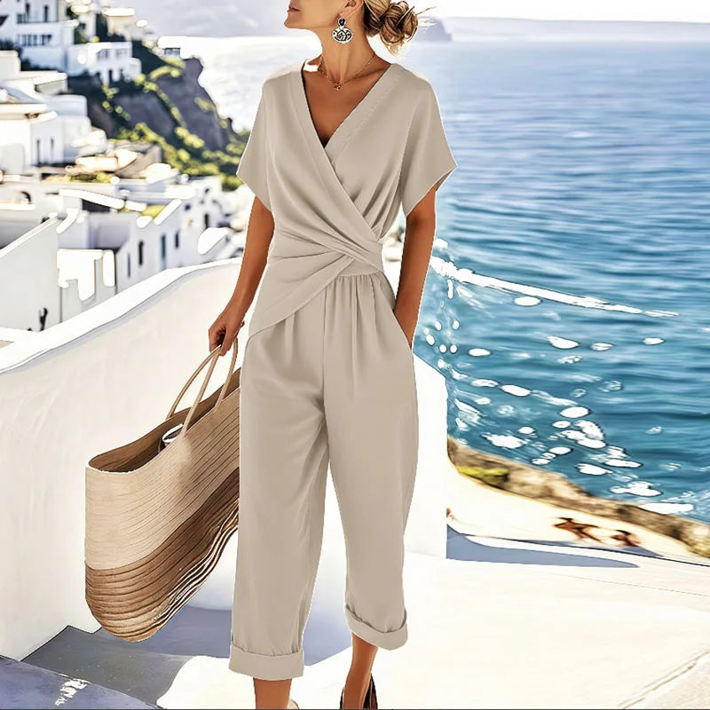Completo coordinato donna elegante: top incrociato e pantaloni a gamba larga. Perfetto per primavera/estate, casual chic.