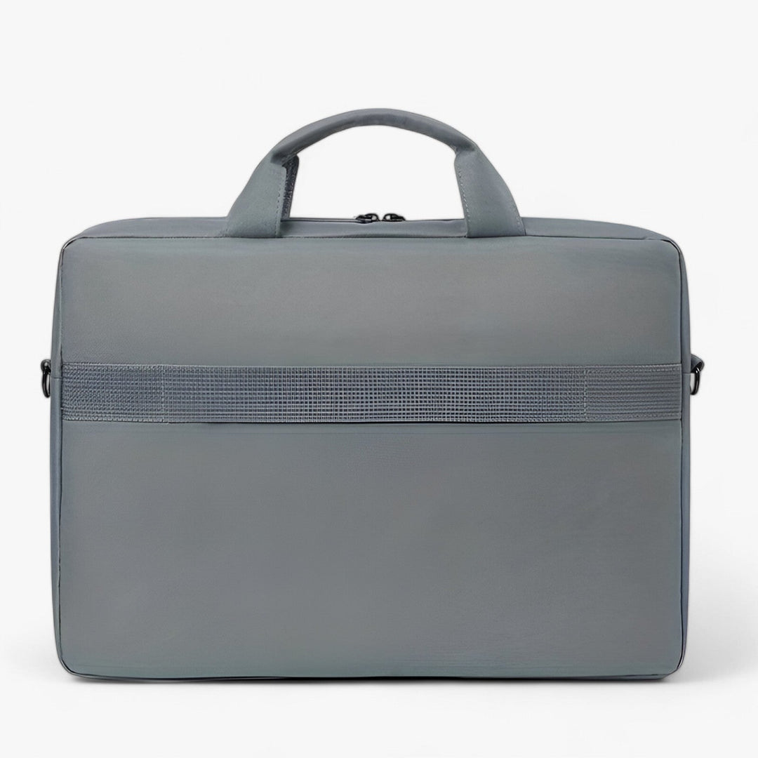 Borsa lavoro rossa per laptop da uomo con tracolla, perfetta per organizzare accessori ufficio e viaggi d'affari.