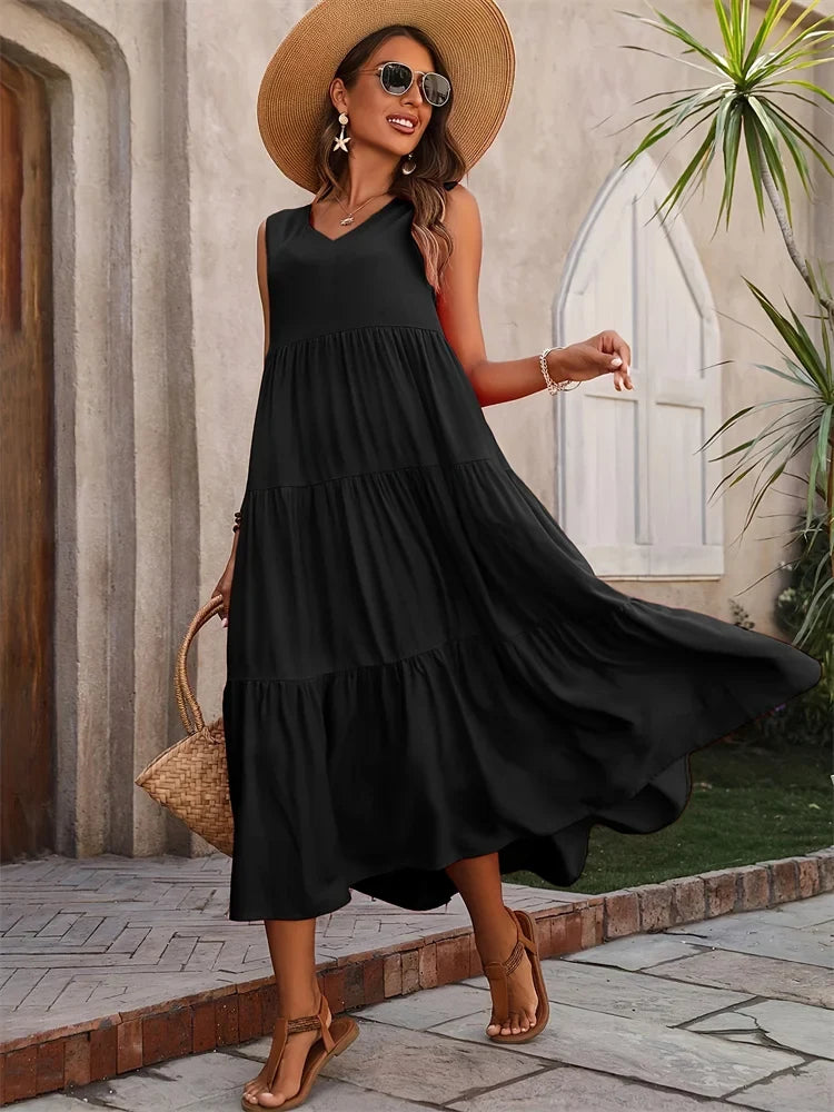 Abito lungo estivo donna in stile casual con balze delicate e scollo a V, senza maniche.