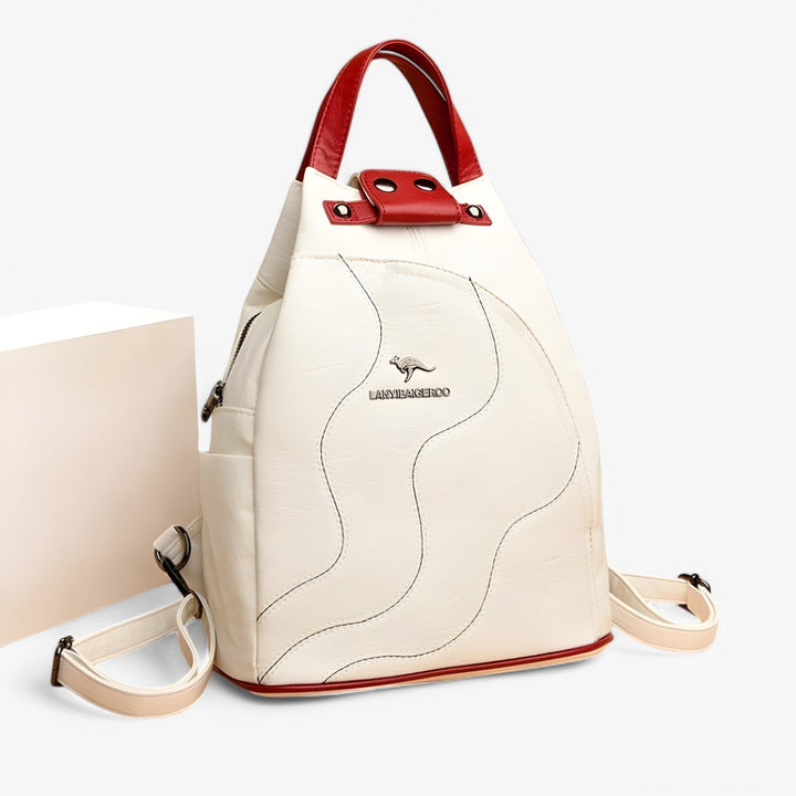 Borsa zaino donna alla moda, compatta e chic, accessorio indispensabile per ogni outfit elegante. Perfetta per viaggio.