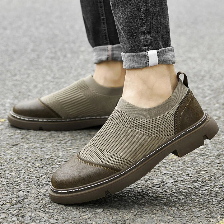 Dettaglio scarpa uomo con tomaia traspirante. Sneakers flessibili e comode, perfette per il comfort quotidiano.