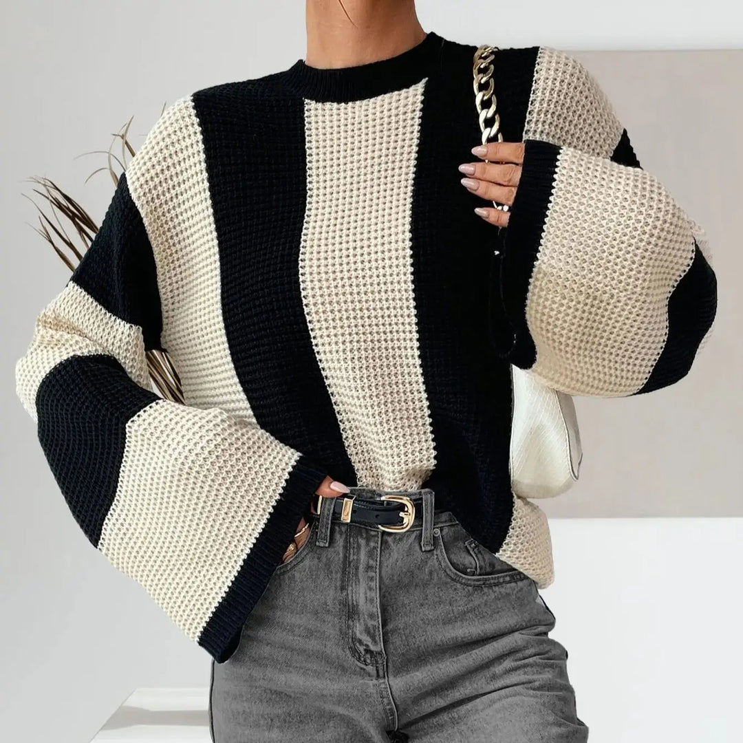 Maglione donna casual girocollo, vestibilità ampia e maniche scese. Comfort e stile per ogni giorno.