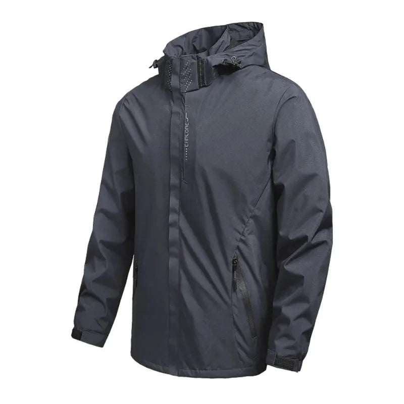 Dettaglio giacca softshell unisex grigia: cerniera resistente e tasche funzionali per abbigliamento esterno.