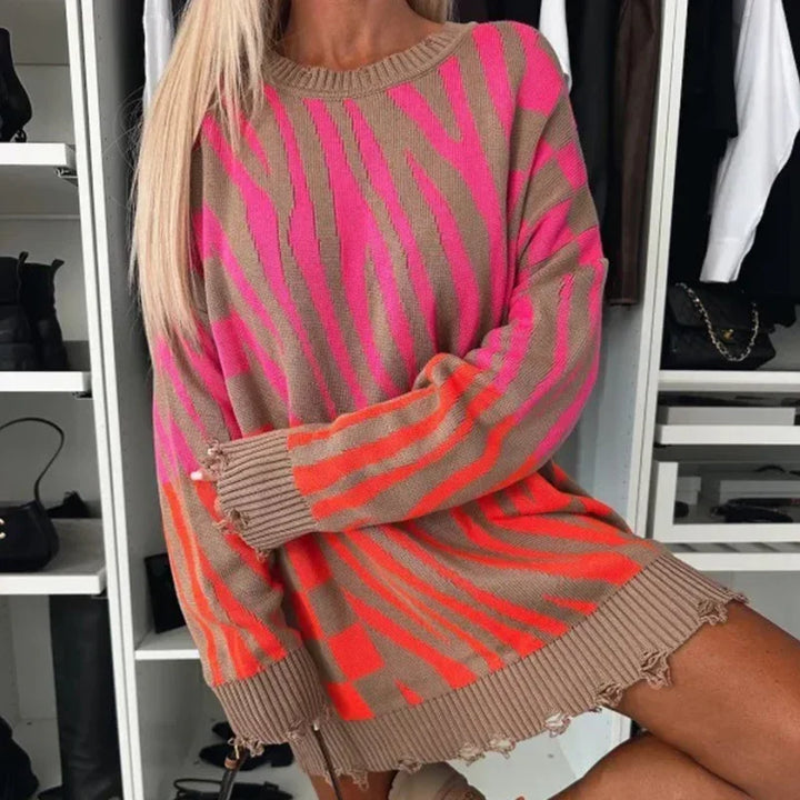Maglione donna zebrato elegante. Pullover oversize comodo per moda autunno/inverno. Look casual chic.
