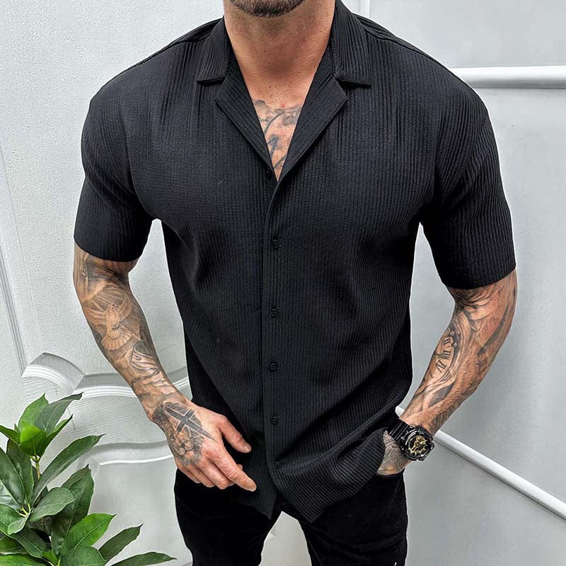 Camicia uomo slim fit nera, maniche lunghe, bottoni classici, elegante per ufficio e smart casual.