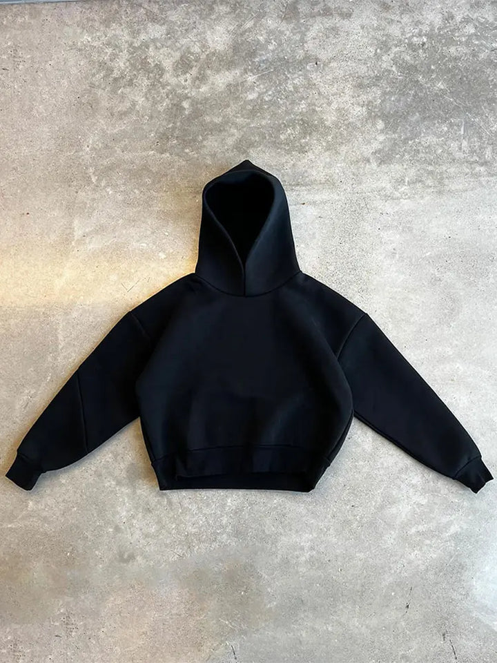 Felpa con cappuccio e jogger oversize per uomo, un set sportivo comodo e moderno per l'inverno.