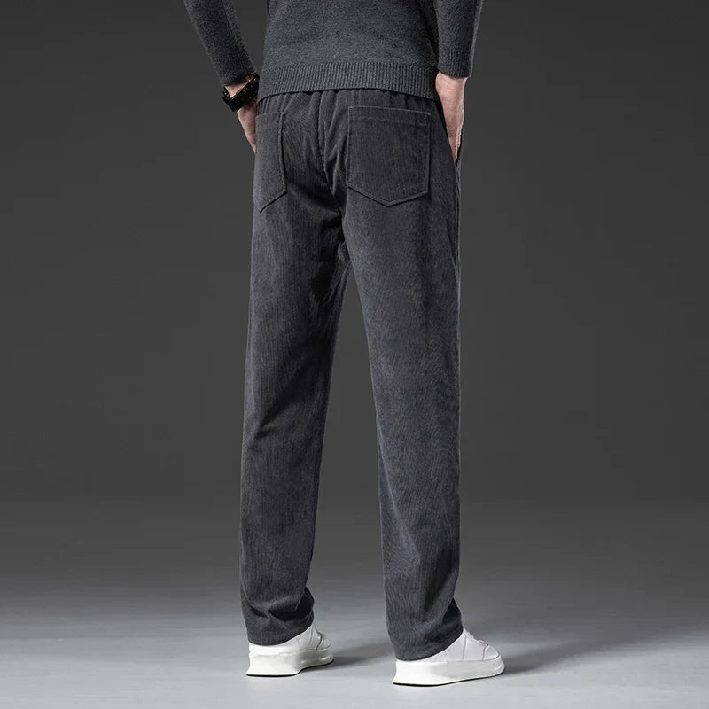 Pantaloni uomo formali a gamba dritta, vita regolabile, perfetti per l'ufficio o outfit casual-eleganti.