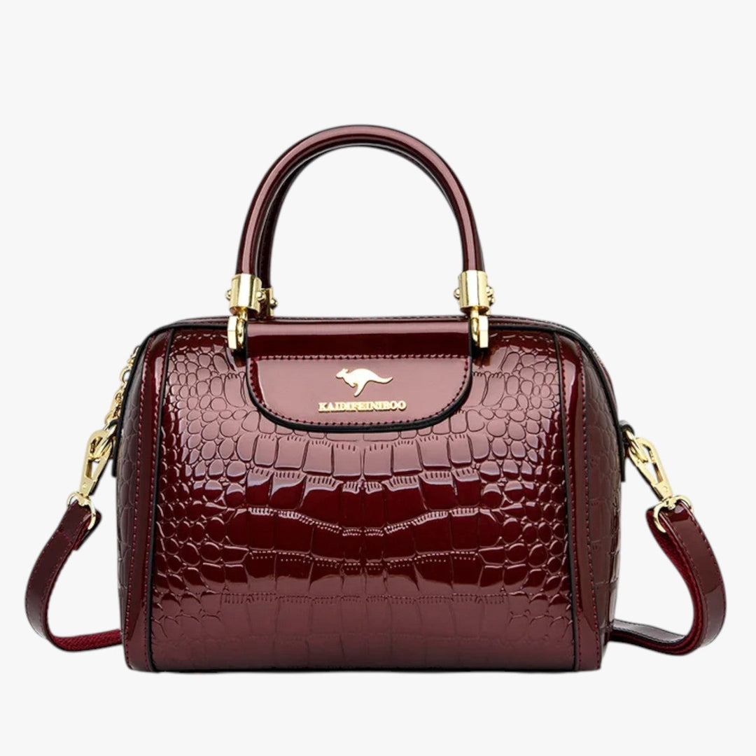 Borsa a mano donna, dettagli effetto coccodrillo e palette multicolore, ideale per occasioni diverse.