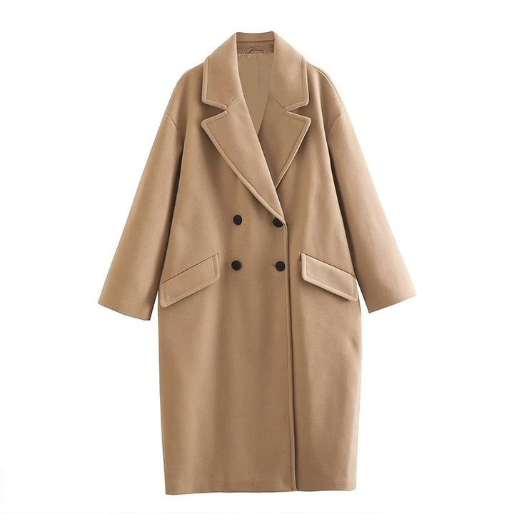 Cappotto invernale donna, taglio lungo doppiopetto, un capo versatile ed essenziale.
