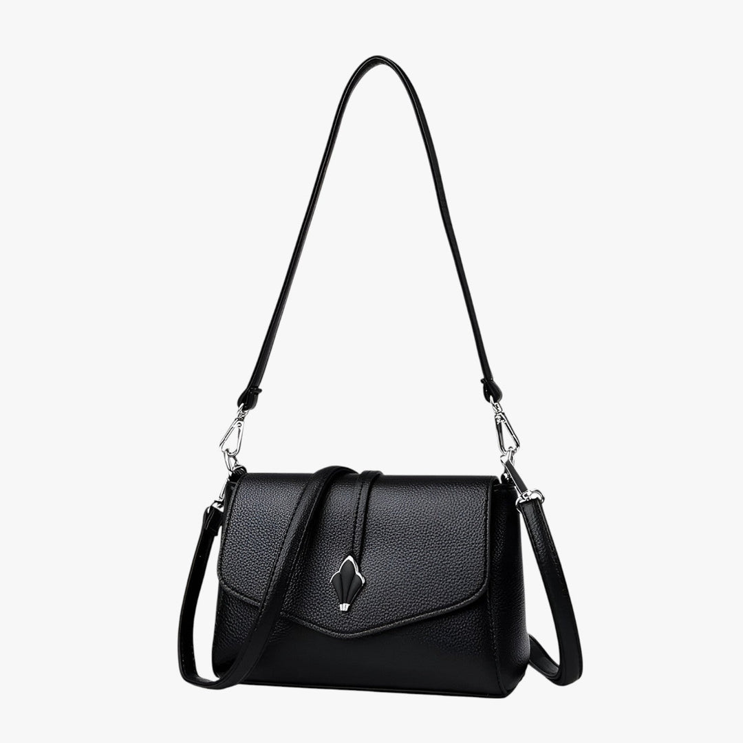 Elegante borsa a tracolla da donna con patta, accessorio moda indispensabile per ogni occasione.