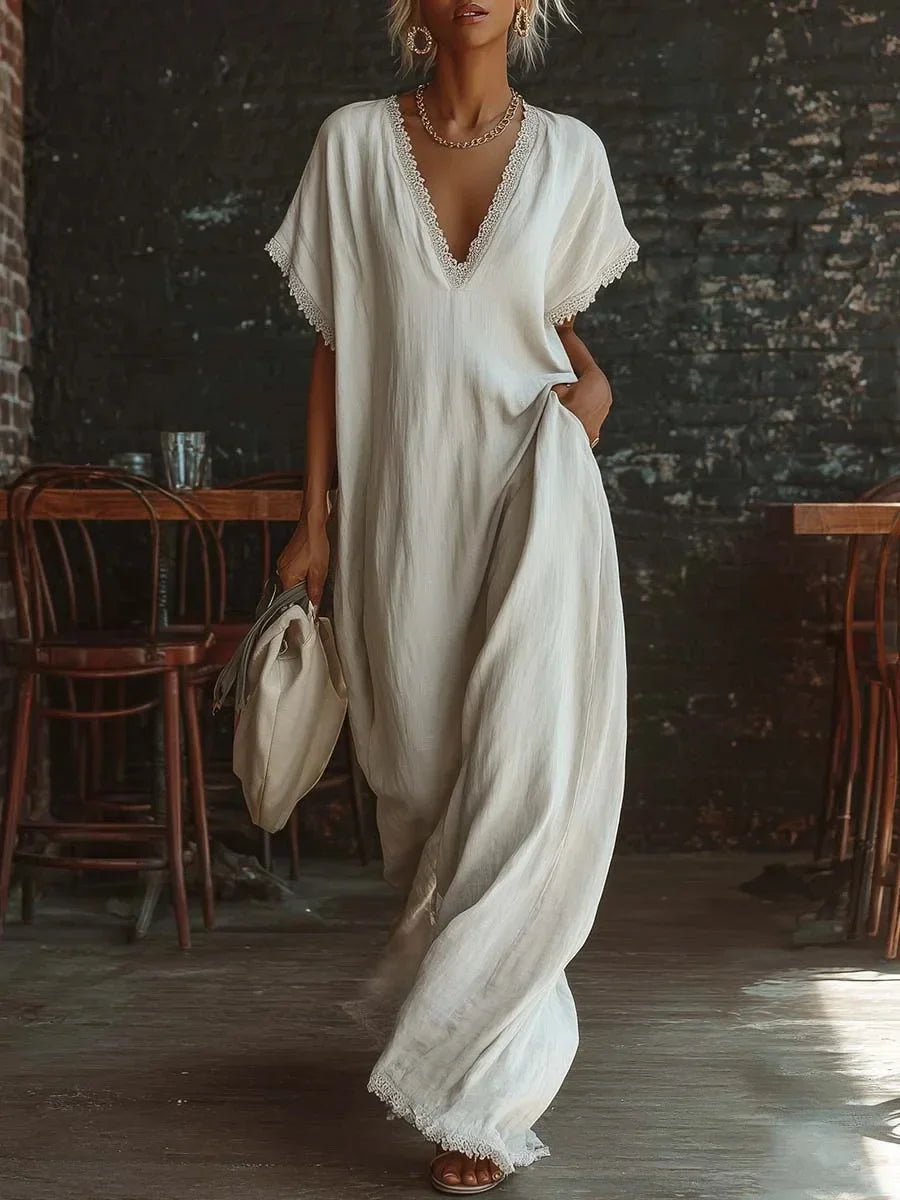 Abito lungo donna fluido, stile casual chic, scollo V e dettagli in pizzo, fresco e leggero.