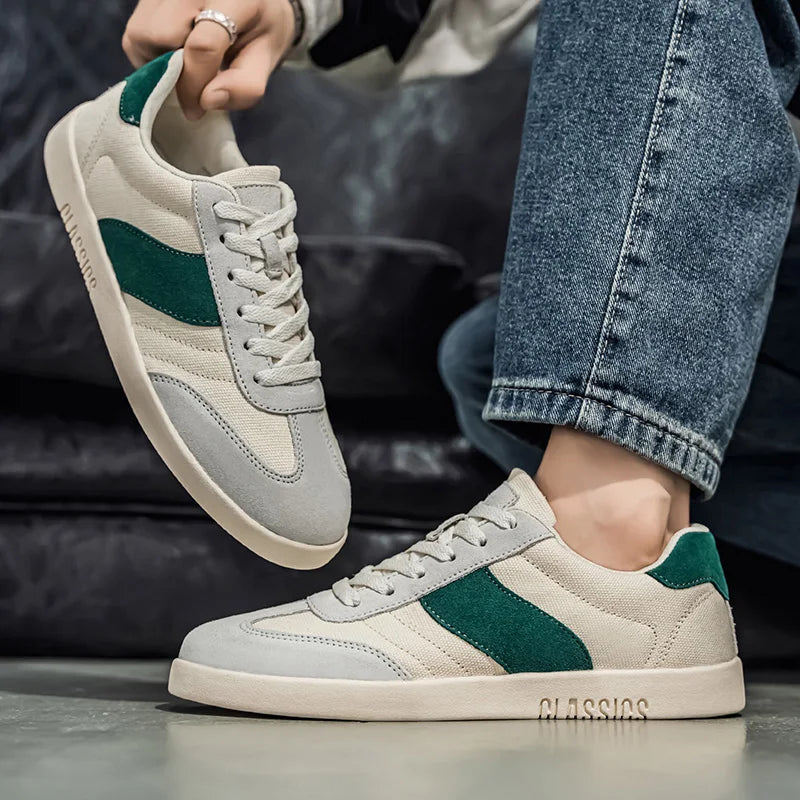 Sneakers casual uomo alla moda, design moderno e comfort leggero per ogni occasione.