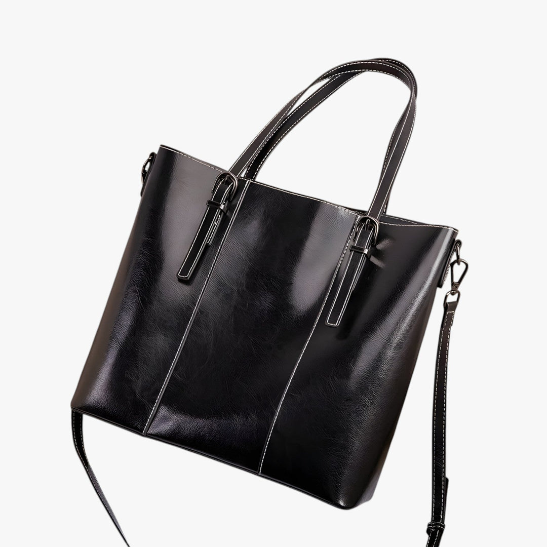 Capiente borsa tote donna marrone scuro, ideale per tutti gli accessori quotidiani. Eleganza pratica.