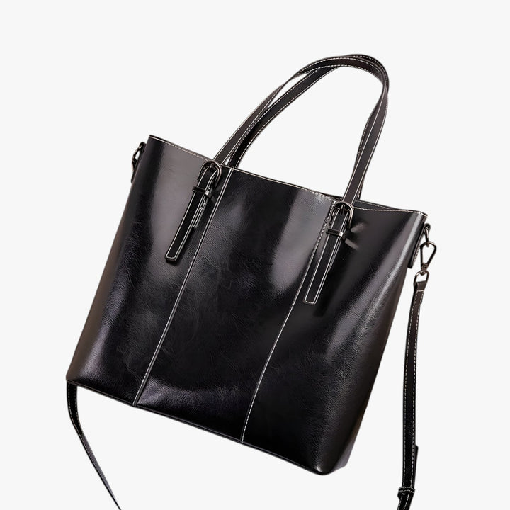 Capiente borsa tote donna marrone scuro, ideale per tutti gli accessori quotidiani. Eleganza pratica.