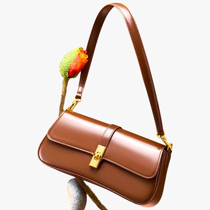 Borsa baguette donna elegante rosso vino, accessorio compatto con tracolla.