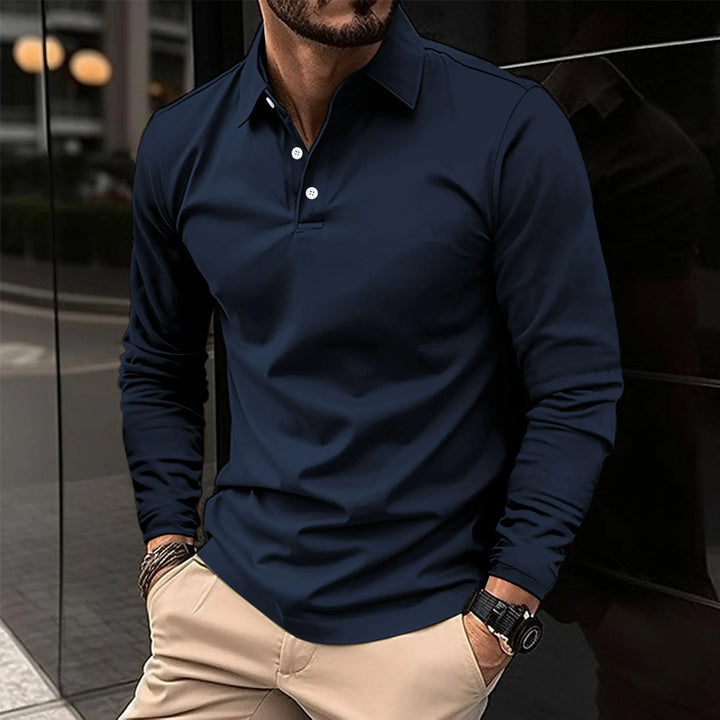 Maglietta polo uomo slim fit, maniche lunghe, valorizza la figura con stile elegante e comfort quotidiano.