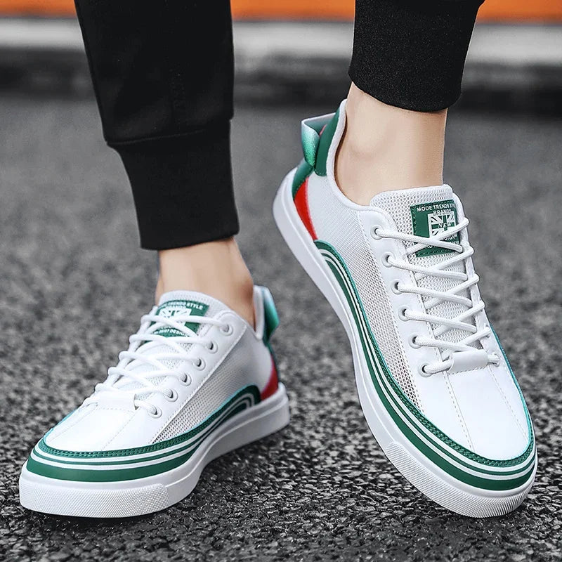 Calzature uomo: sneakers traspiranti e ammortizzate, design moderno. Ideali per un comfort duraturo e stile casual.
