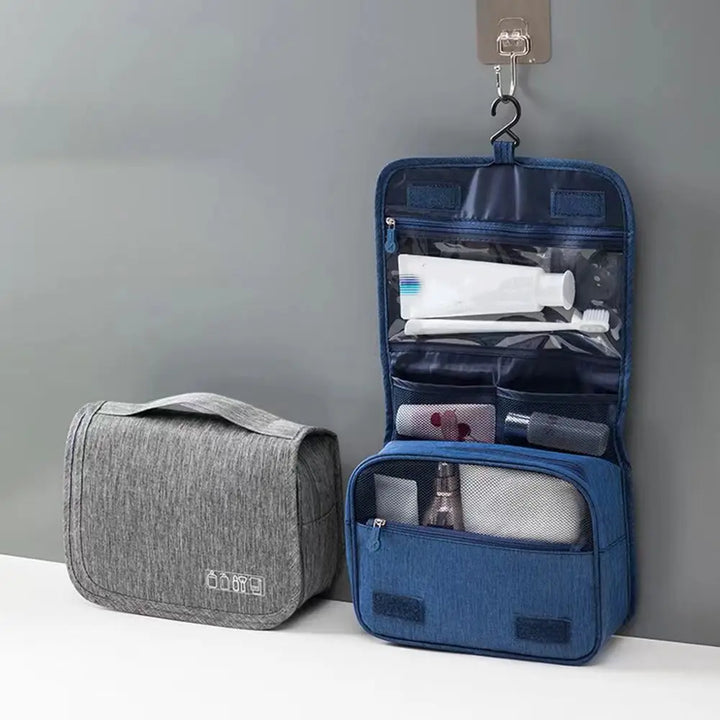 Beauty case portatile da viaggio con gancio, perfetto per cosmetici e articoli da toilette in vacanza.