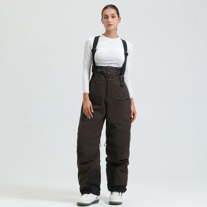Pantaloni da sci unisex grigi, impermeabili e con bretelle, per prestazioni eccellenti sulla neve.