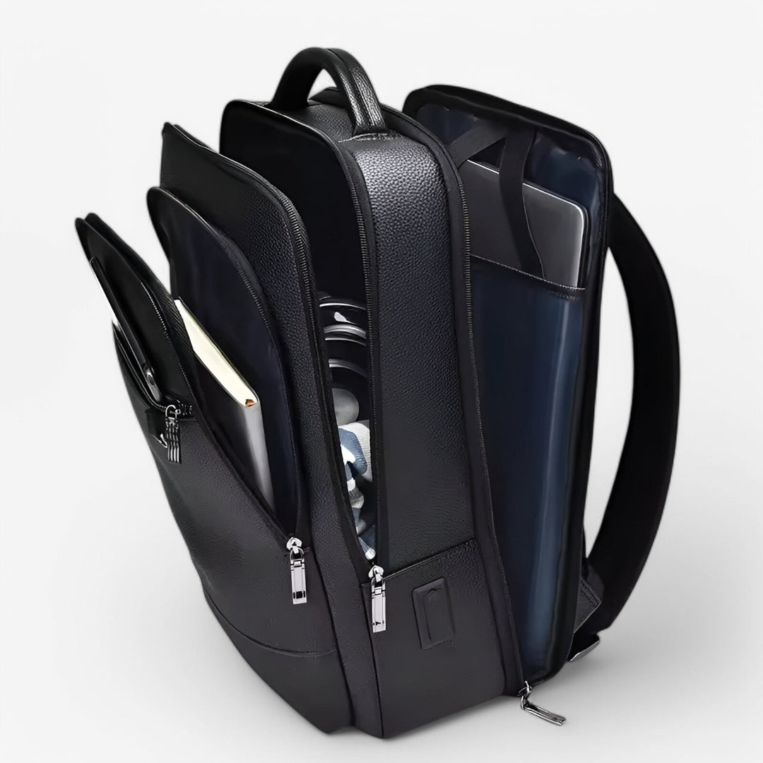 Zaino da uomo porta laptop, comodo e organizzato, nero, ideale per uso quotidiano in ufficio e in viaggio.