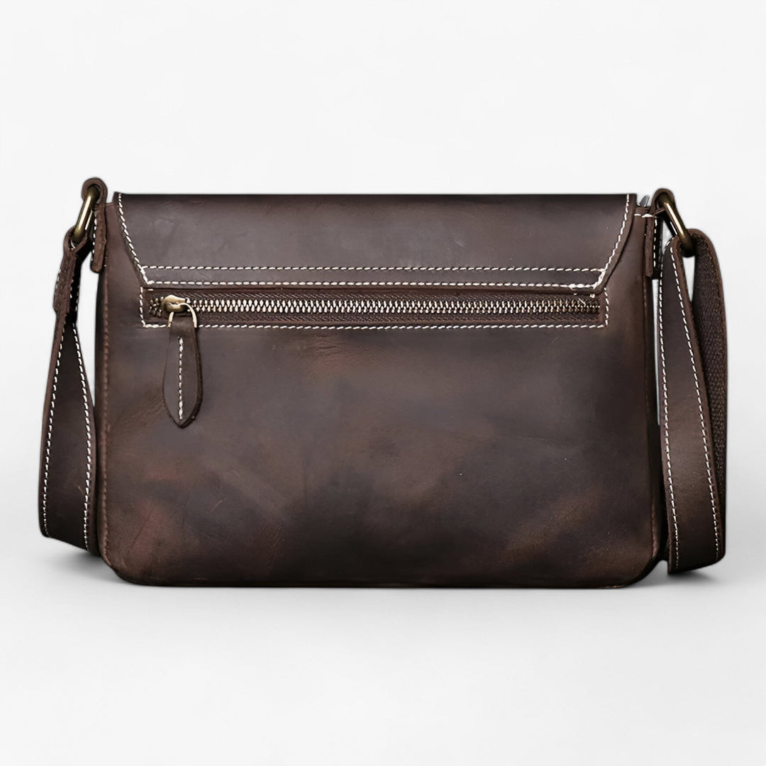 Elegante borsa messenger unisex sintetica, perfetta per un look quotidiano o professionale. Accessorio versatile.