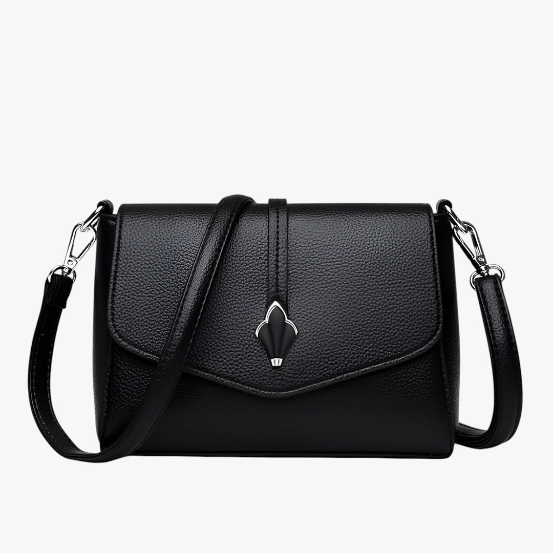 Borsa a tracolla donna versatile, con patta e design elegante. Un accessorio perfetto per ogni giorno.