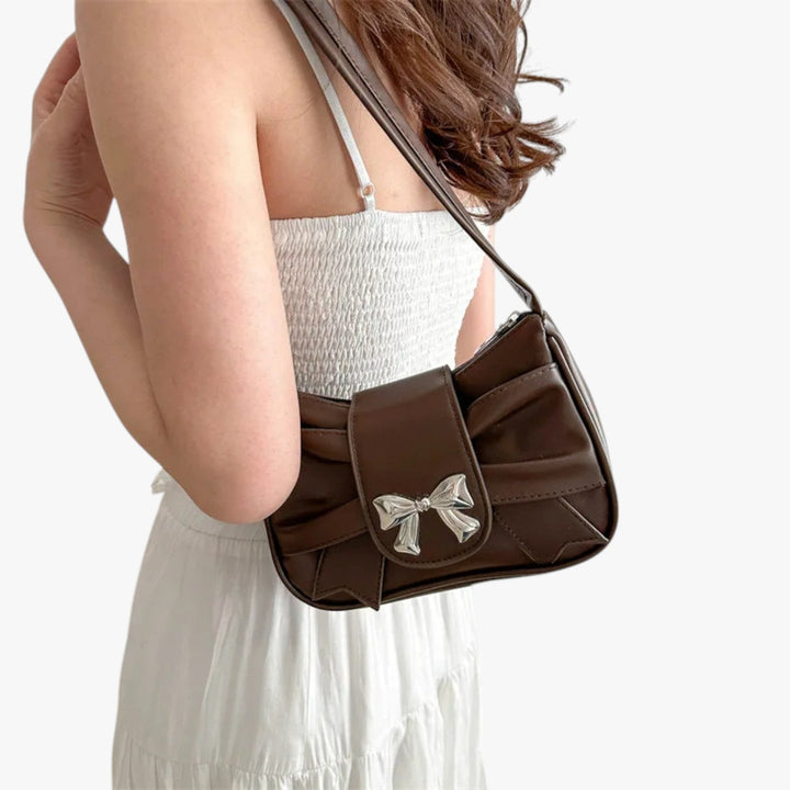 Pochette versatile da donna, borsa a mano compatta per viaggio o uso quotidiano, un must-have.
