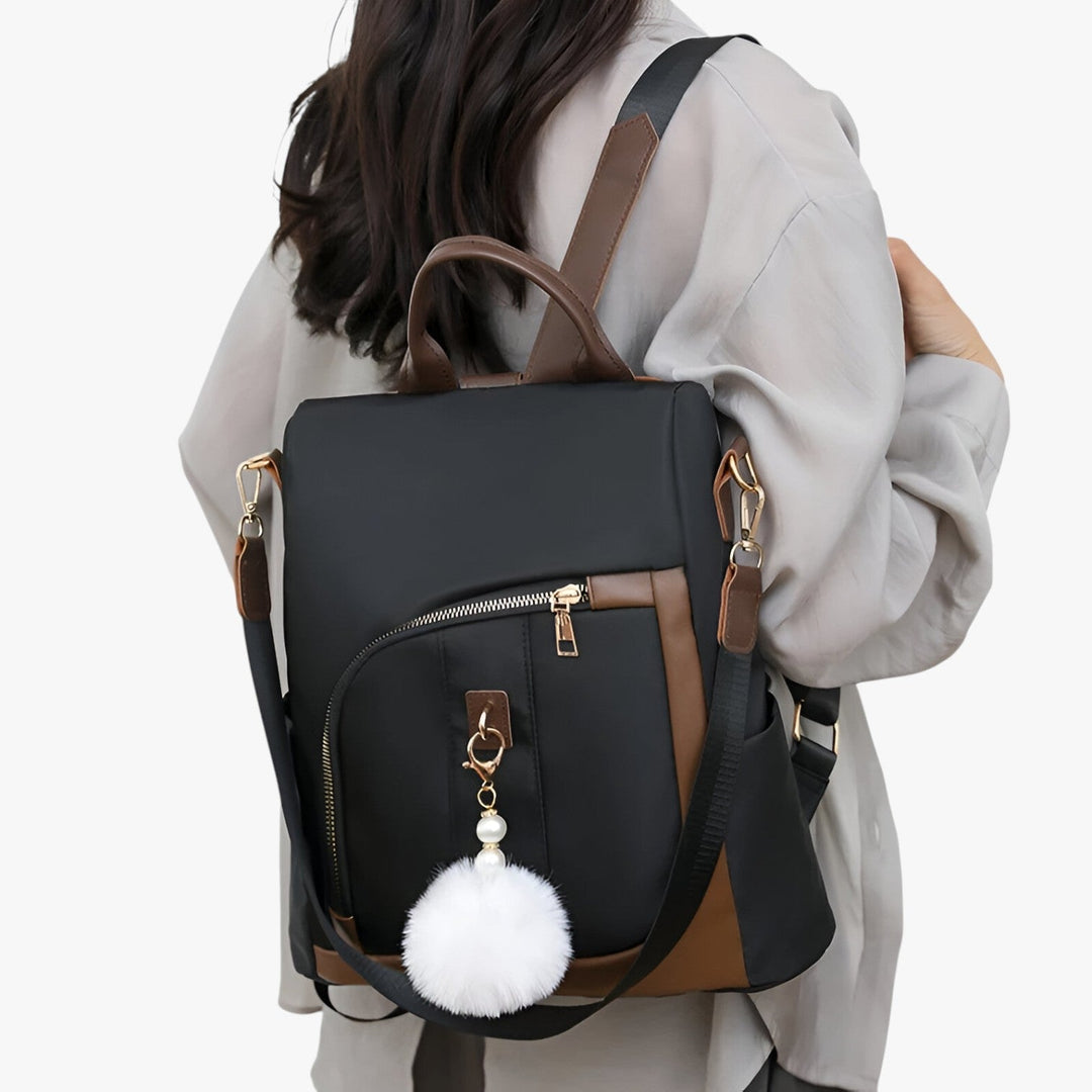 Elegante zaino donna beige, borsa a zaino casual con pompon rimovibile, ideale per la moda quotidiana.