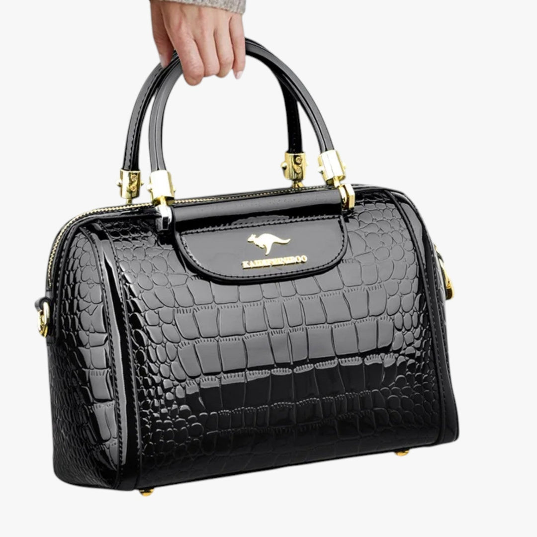 Borsa a mano per donna, stampa effetto coccodrillo e colori vivaci, per outfit di carattere.