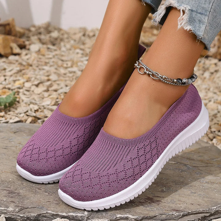 Comfort quotidiano con pantofole estive rosse da donna, traspiranti e con supporto per plantari.