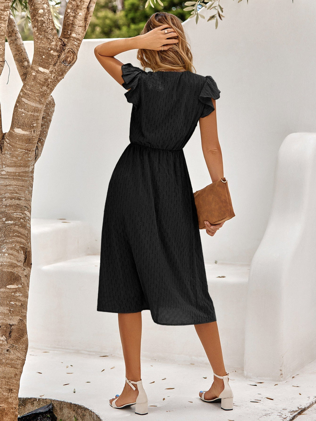 Abito midi da donna chic ed elegante, con volant e scollo a V, per occasioni estive e primaverili.