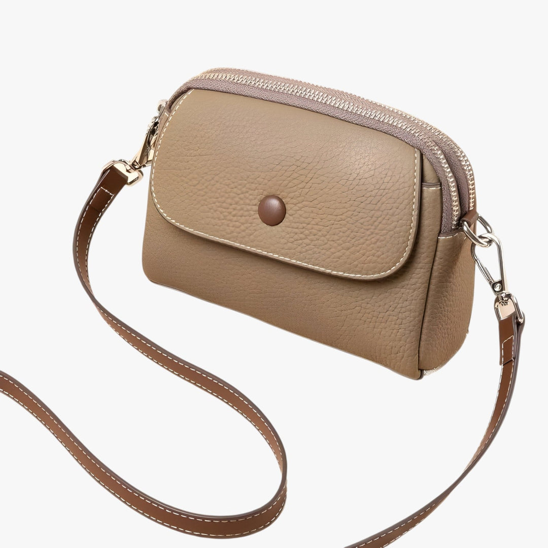 Borsa a tracolla da donna, elegante e versatile, in materiale sintetico. Ideale per il quotidiano e i viaggi.