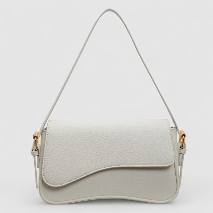Elegante mini borsa a mano bianca in pelle vegana ondulata per donna. Moda sostenibile, perfetta come accessorio sera.
