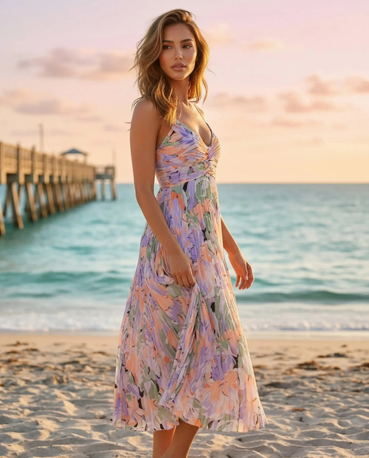 Abito midi donna floreale, plissettato, con scollo a V, leggero ed elegante, moda estiva.
