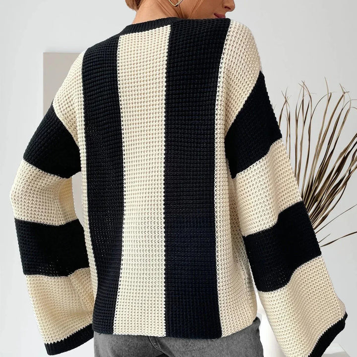 Versatile maglione donna girocollo ampio, con spalle scese, perfetto per un look rilassato invernale.