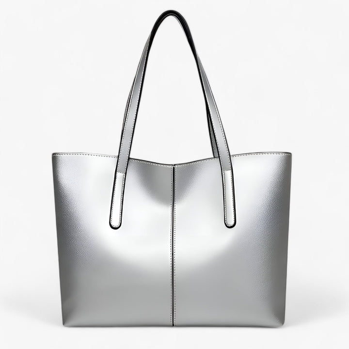 Borsa tote donna argento, design elegante e capiente, perfetta per accessori e look versatili.