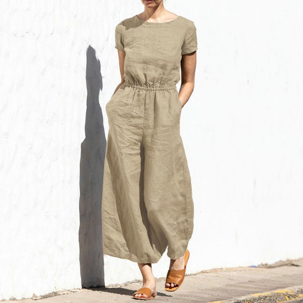Elegante tuta estiva donna a gamba larga con girocollo, tinta unita. Crea un outfit unico e raffinato.