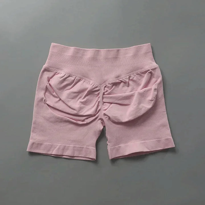 Pantaloncini running donna seamless, vita alta, elasticizzati per ogni falcata.