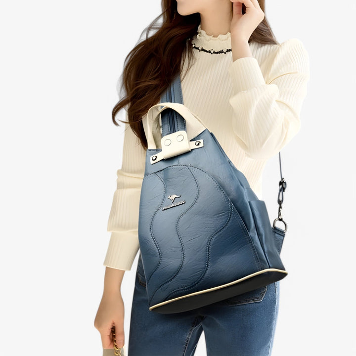 Zaino donna compatto beige/cachi, stile elegante e pratico per ogni occasione, da viaggio a quotidiano.