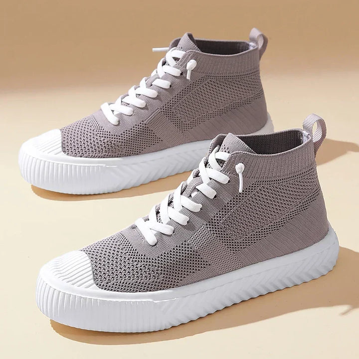 Sneakers uomo high-top traspiranti senza lacci, con soletta ortopedica per comfort sportivo e stile casual.