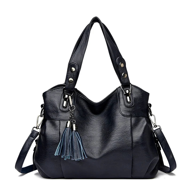 Borsa a spalla blu da donna, design moderno e spazioso. Perfetta come borsa tracolla per ogni giorno.