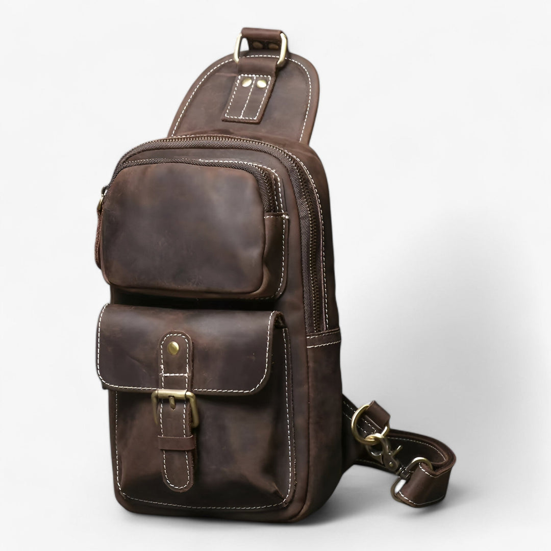 Borsa monospalla uomo nera elegante e funzionale, con ampi scomparti per oggetti personali, perfetta per viaggio.