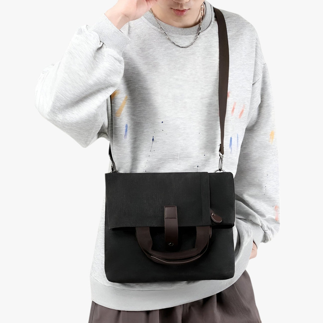 Borsa a tracolla messenger grigia in tessuto resistente, pratica per l'uomo in movimento.