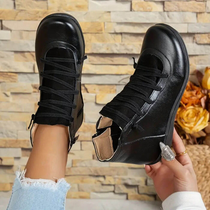 Stivaletti marroni eleganti, scarpe donna comode con tacco stabile, perfette per un look versatile.