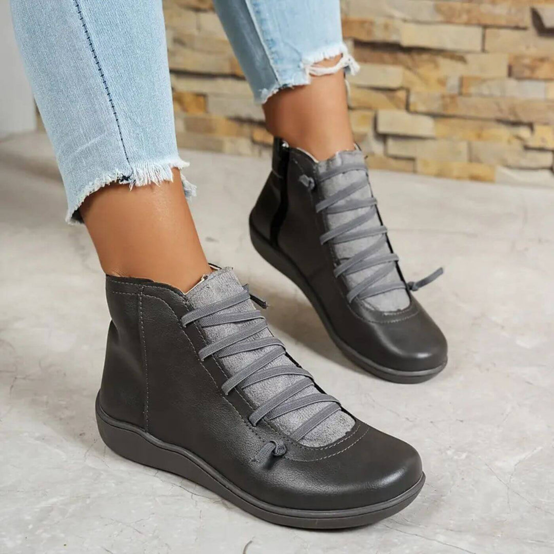 Stivaletti donna neri, scarpe eleganti e comode, con tacco stabile per comfort e stile nella moda quotidiana.