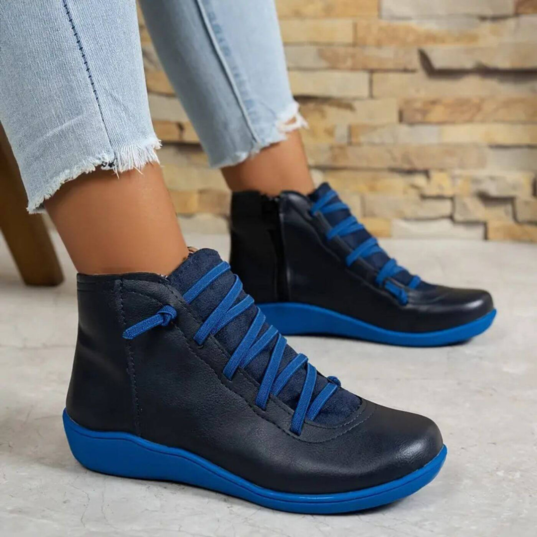 Stivali alla caviglia rossi da donna, moda e comfort. Stivaletti eleganti con tacco stabile per versatilità.